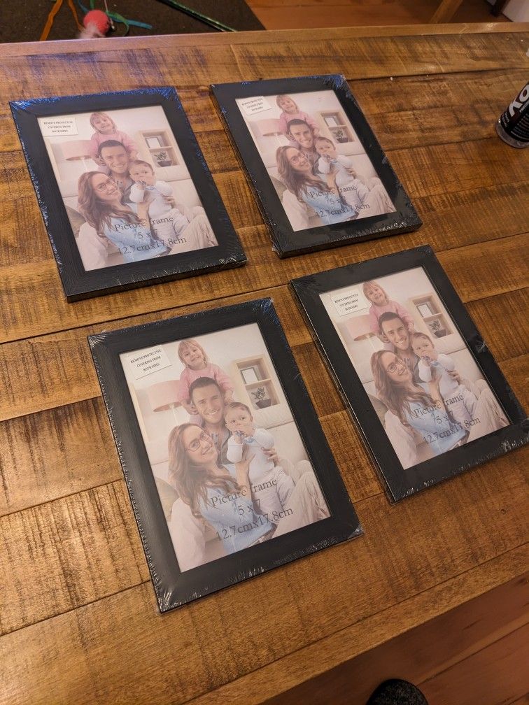 Four 5x7 Picture Frames