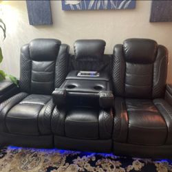 Faux Leather Sofa And Loveseat By Ashley Furniture