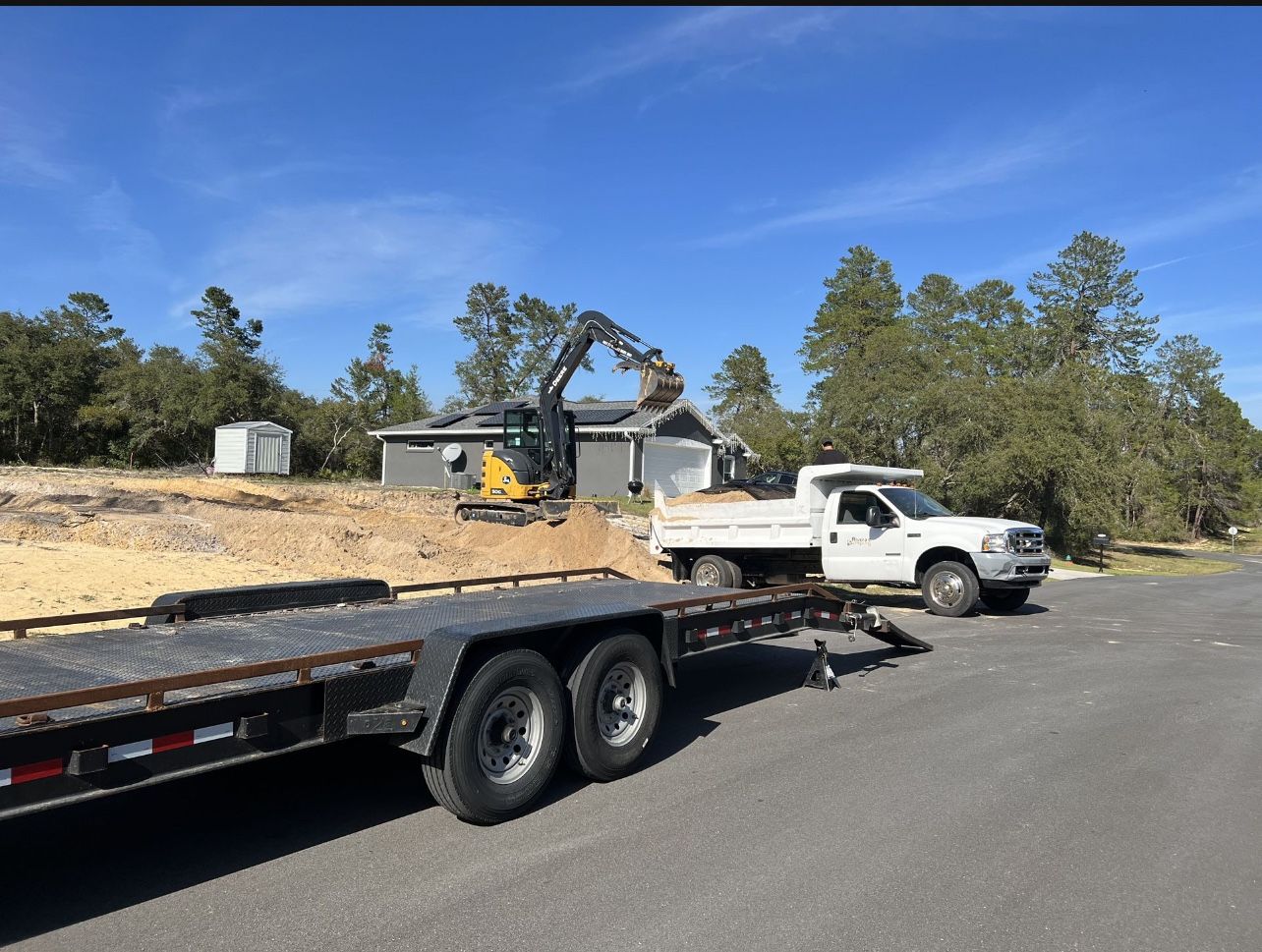 Drive ways Forestry mulching Land clearing Bush hogging and Dirt moving Finish Grade and Building Pad