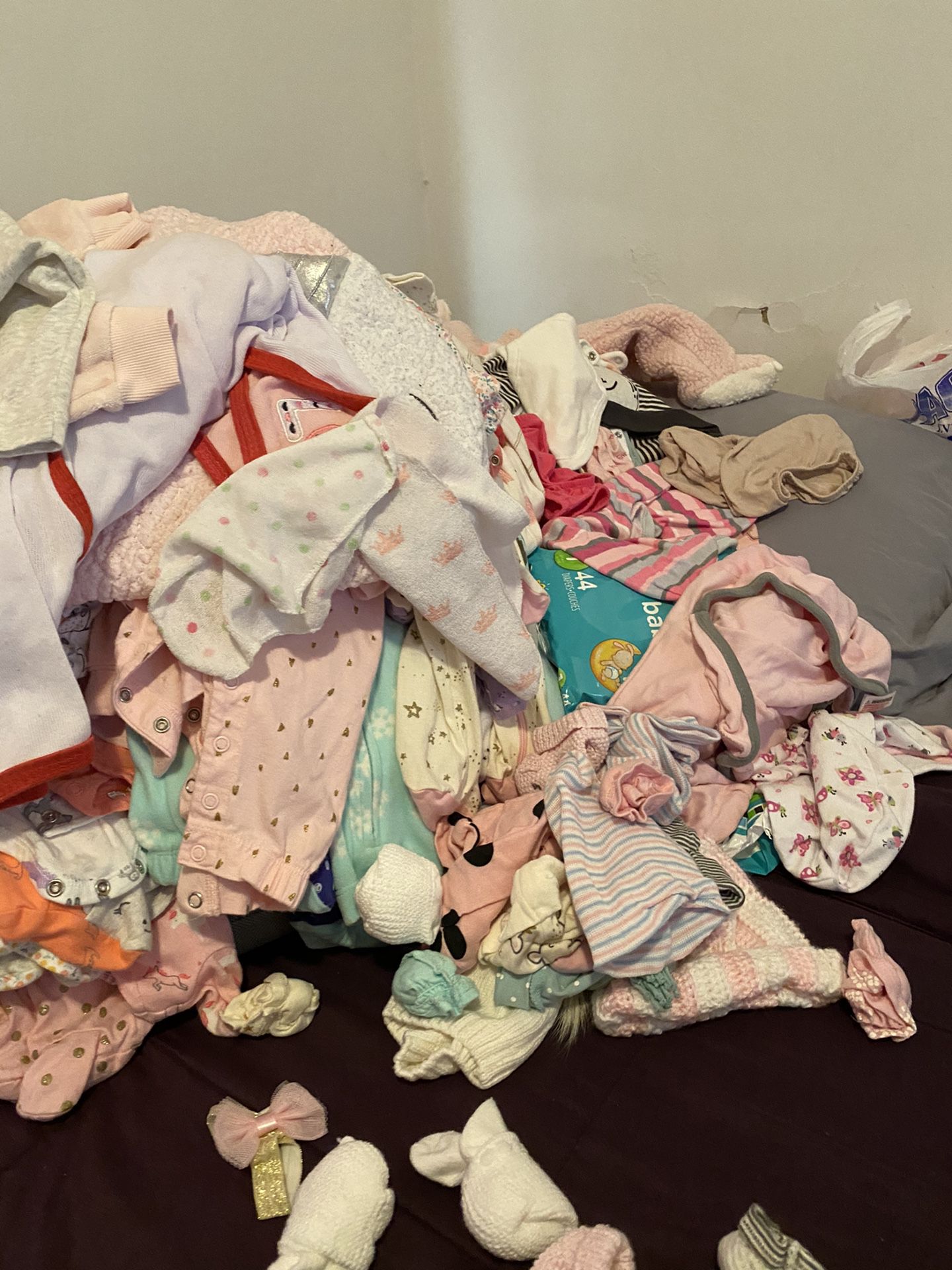Baby girl clothes and diapers