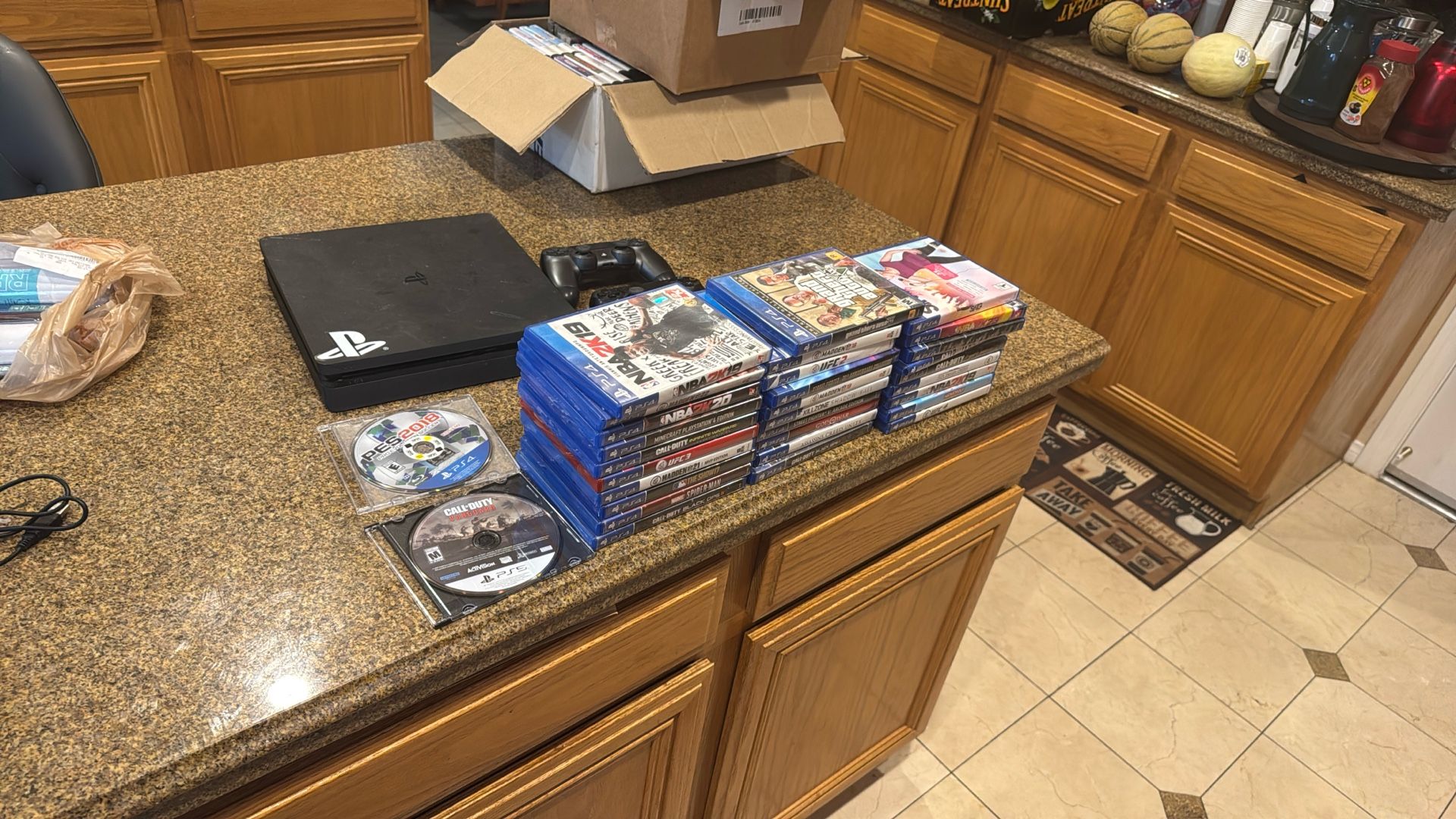 PS4 with (31 Games) Two Controllers