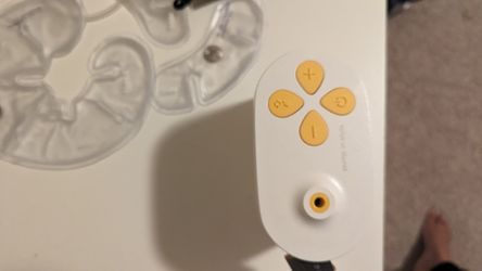 Madela Breast Pump And Breast Warmers