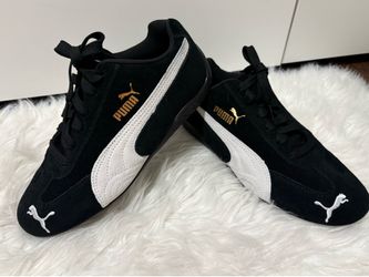 Like new Women’s black puma sneakers