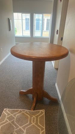 Solid wood oak pub table with glass