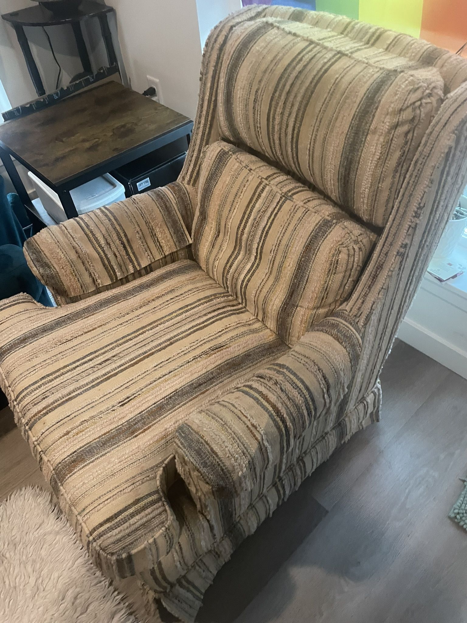 Two Swivel Rocket Chairs With Ottoman