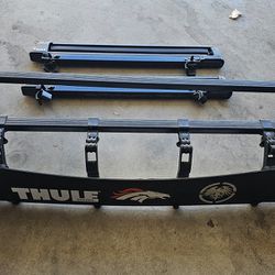 Thule crossbars and ski/snowboard carrier