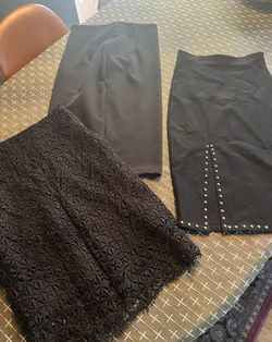3 women’s black skirts - size small