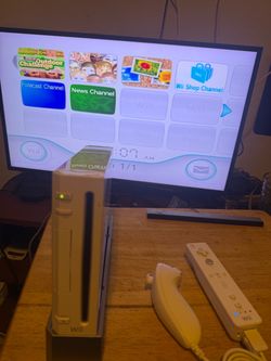 Nintendo Wii Console with Wiimote and Nunchuk
