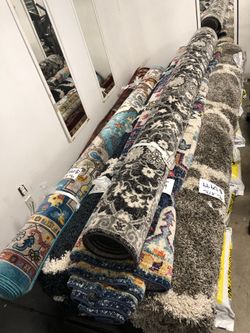 Lots of rugs, different prices, starting at $35