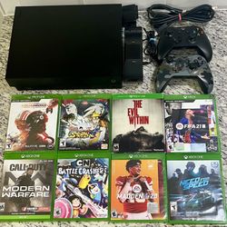 Xbox One X with Controllers and Games