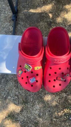 Red crocs with charms