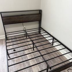 A bed with a mattress in good condition! (Queen size)