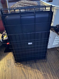 Medium sizes smaller doggie crate still like new 35 don’t need