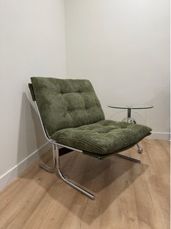 Olive green and chrome accent chair
