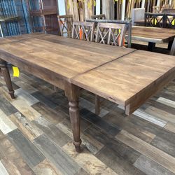 EXTENDABLE SOLID WOOD DINING TABLE W/ SELF-STORING EXTENSIONS