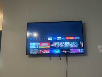 Toshiba  50 inch  smart Tv (On wall)