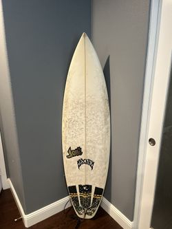 Lost Surfboard 5’9 fins included