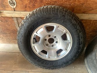 17" Chevrolet Stock Rims And Tires Complete Set