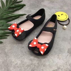 New black jelly shoes with big bows