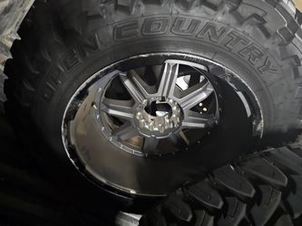 5 big rims and tires