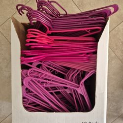 Tons Of Pink Plastic Hangers 