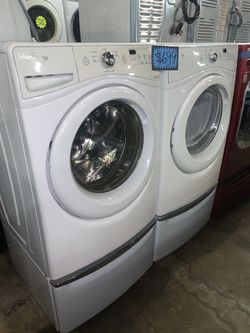 WHIRLPOOL front load washer and matching electric dryer with pedestals in excellent conditions