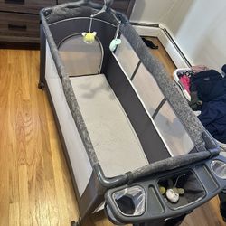 BabyBond Baby Bassinet Bedside Crib, Pack and Play with Sheet, Diaper Changing Table and Music Mobile