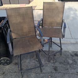 2 high outdoor chairs