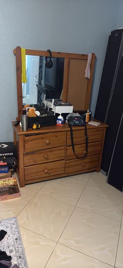 Wooden dresser with mirror