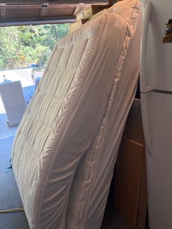 Two twin mattresses with pillow toppers