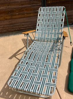 VINTAGE ALUMINUM CHAISE LOUNGE – RETRO WEBBED PATIO CHAIR – $125
