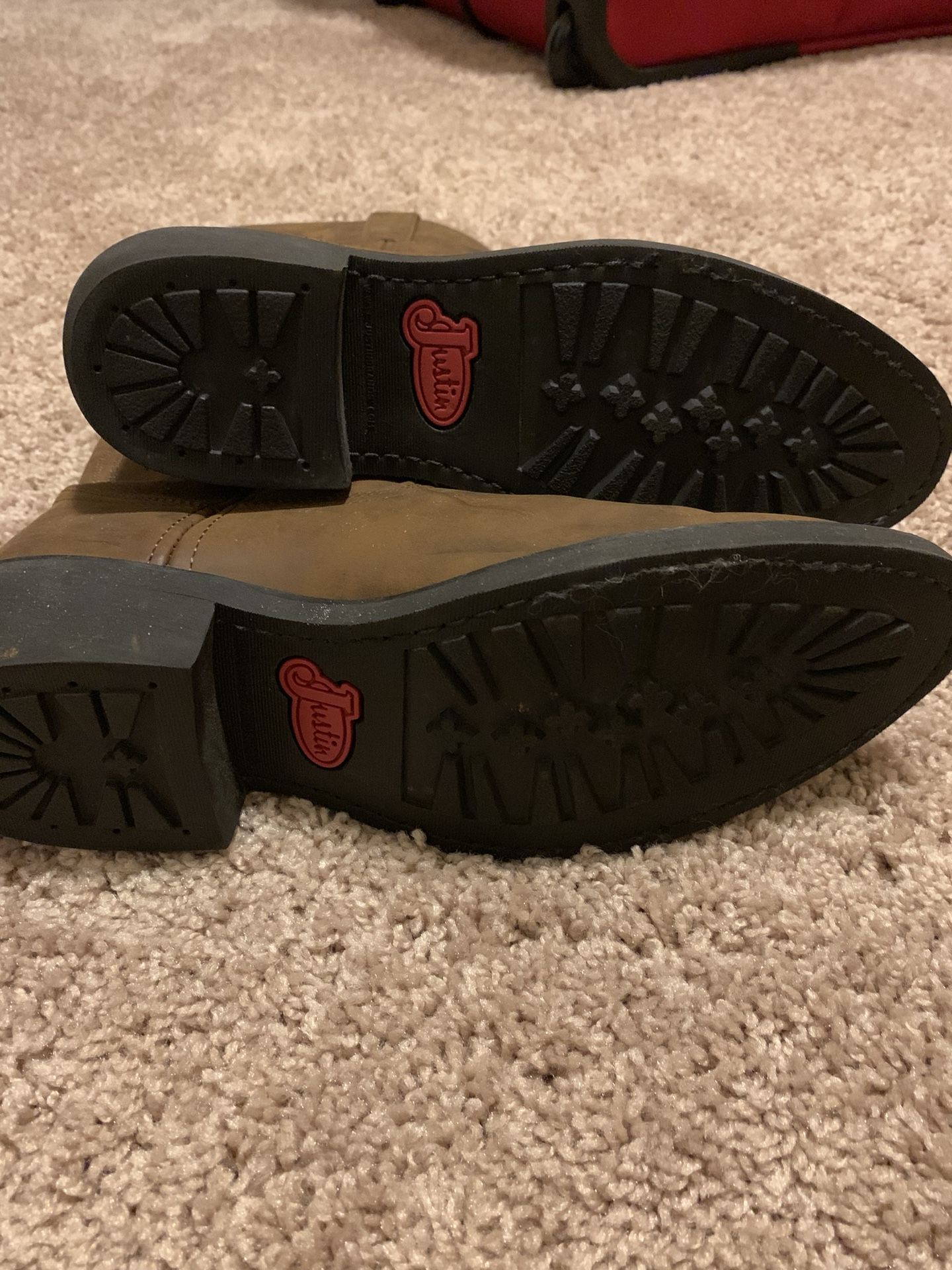 Men’s Justin boots. New size 8.5m