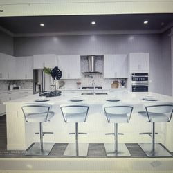 Luxury White Flat Panel, Kitchen Cabinets, and Island And  Pristine Quartz Countertops