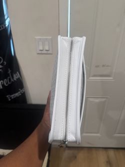 white toiletry goyard bag
