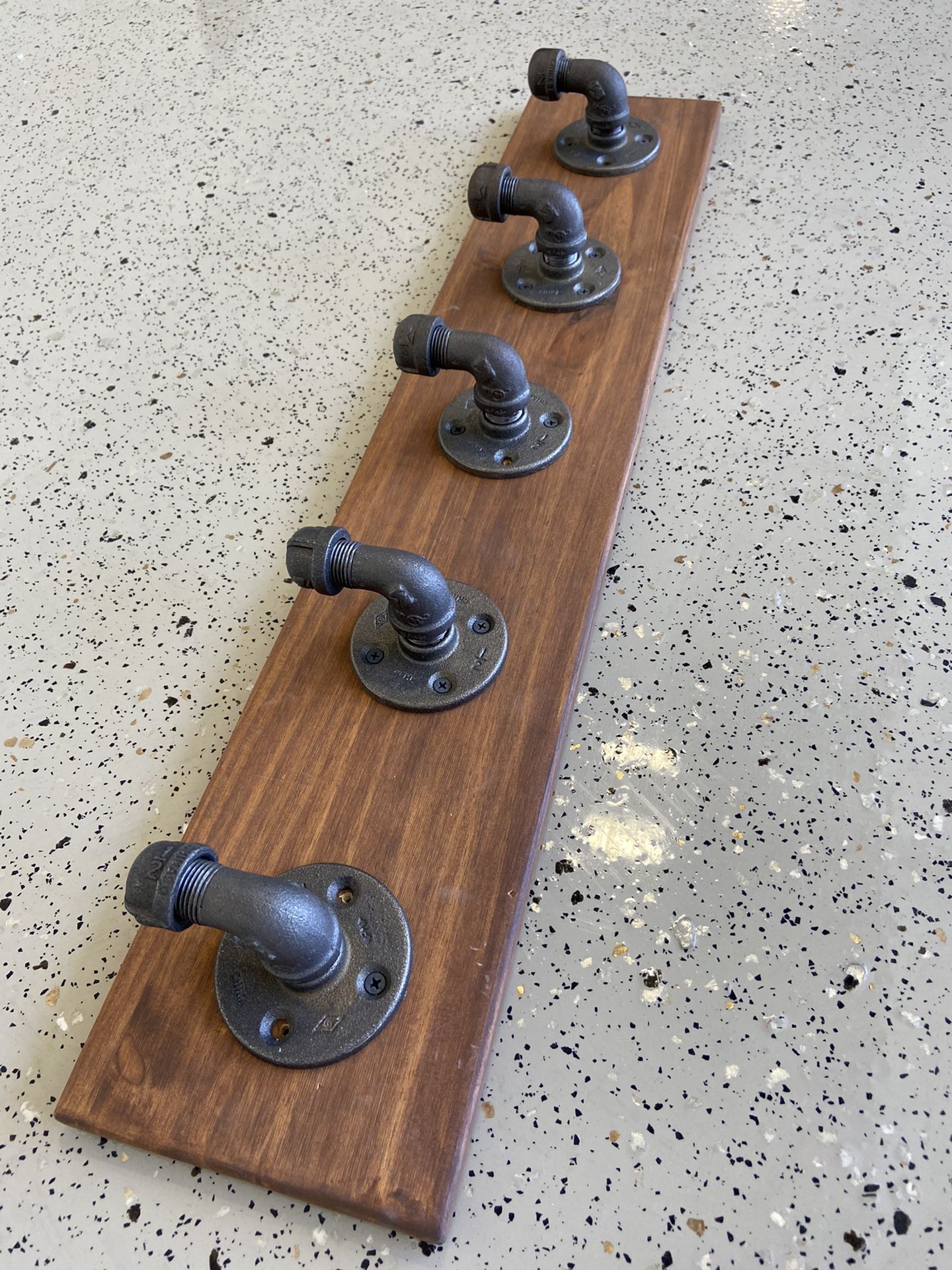 Industrial pipe coat rack