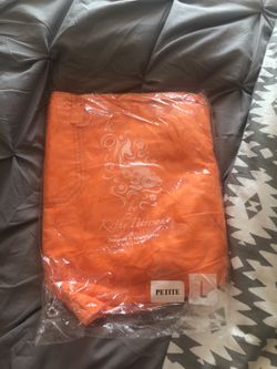 Top is used. Bottoms are brand new with tags both large