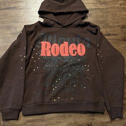 Brown rodeo Travis Scott/spider hoodie