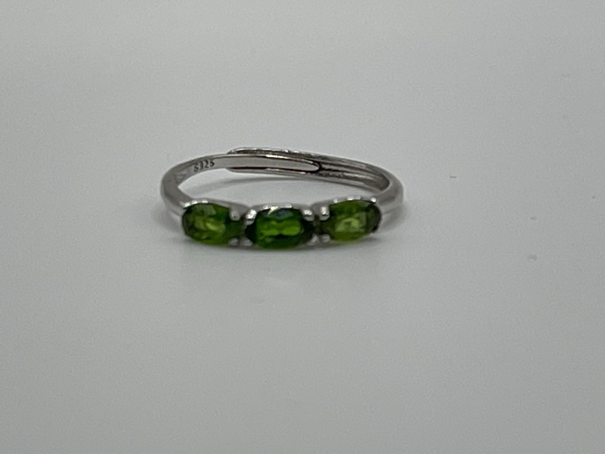 A natural diopside stone from Russia ring in sterling silver that is adjustable