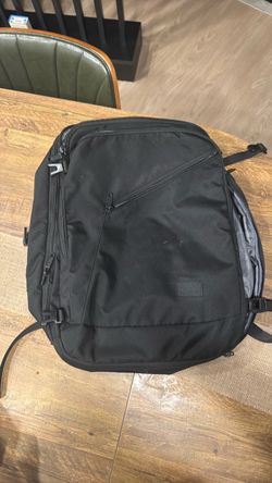 Black Travel Backpack with Multiple Compartments