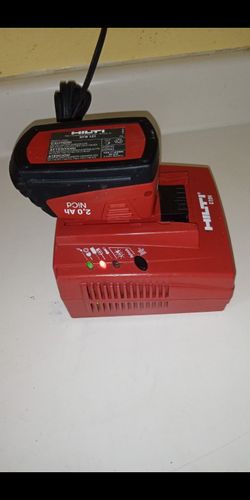 Hilti Battery And Battery Charger In Excellent Condition 