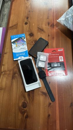 Brand new iPhone SE ( I cloud locked) and accessories