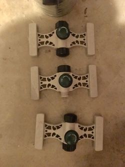 Set of three lawn sprinklers