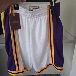 Both Jerseys Are Youth Large. Shorts Are Men's Small