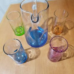 Glass pitcher and cups/jarra de vidrio y vasos