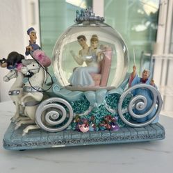 Vintage Disney’s 50th anniversary Cinderella musical snowglobe that plays “So This is Love” by Al Hoffman. Music has been tested and works. Does come 