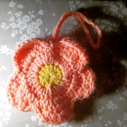 Crochet pink flower pouch