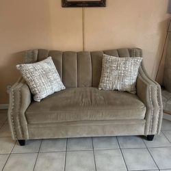 Beige loveseat