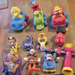 11 Vintage sesame street and disney action figures