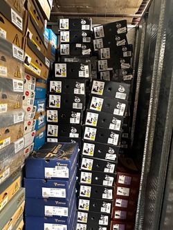 LOTS OF SHOES  AND WORK BOTS MORE THAN 450