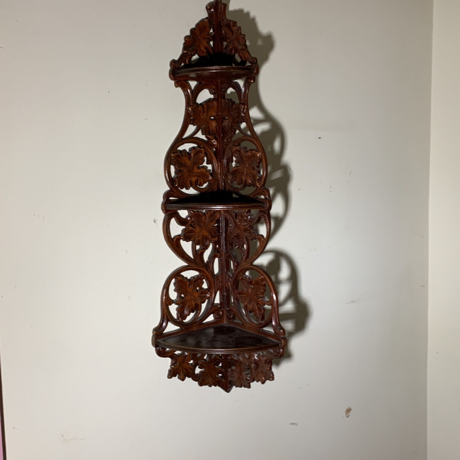 Antique mahogany corner shelf